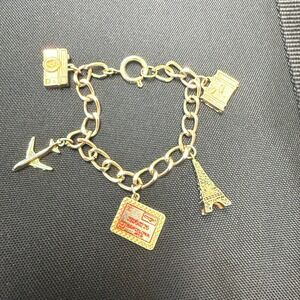 Gold Tone Travel Charm Bracelet Eiffel Tower Airplane Barcelona Stamp Camera